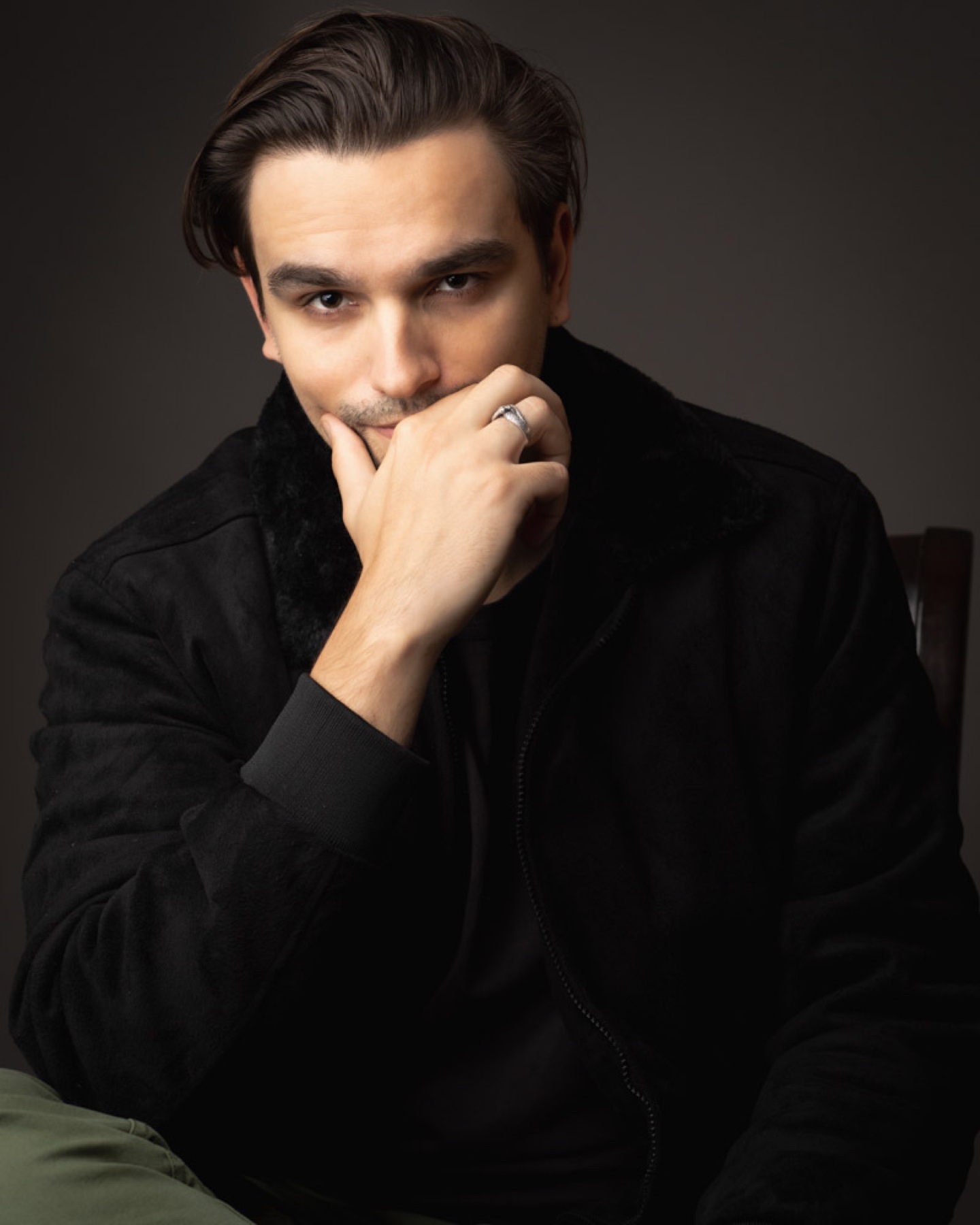 Fashion portrait of a man in a black jacket